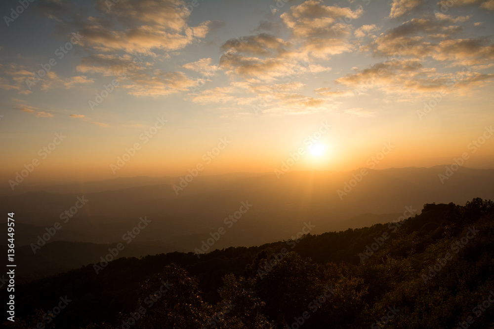 Sunset at the Mountain Hill,Beautiful sunlight, Golden lights background
