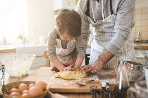 A father and his son cooking
