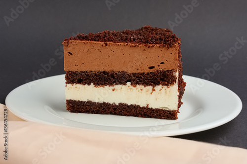 portion of chocolate layer cake on plate