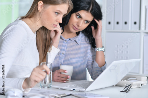 two young girls working 