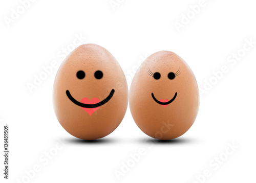 two happy eggs couple with love isolated on white.