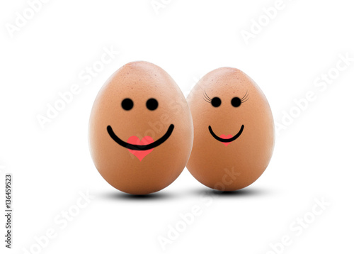 two happy eggs couple with love isolated on white.