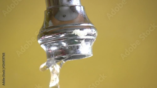Faucet being turned on and then off.
