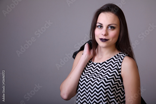 Fashion portrait of beautiful young woman