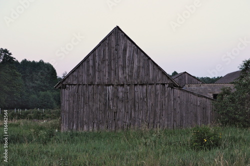 Old weathered wooden barn side view