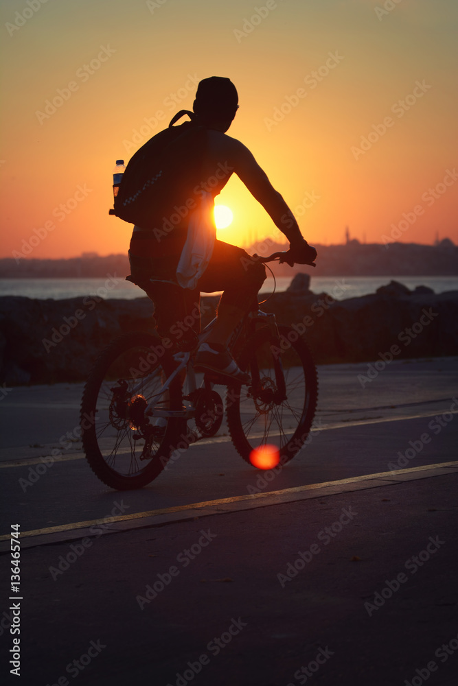 Obraz premium Bicycling At Istanbul Sunset, Turkey