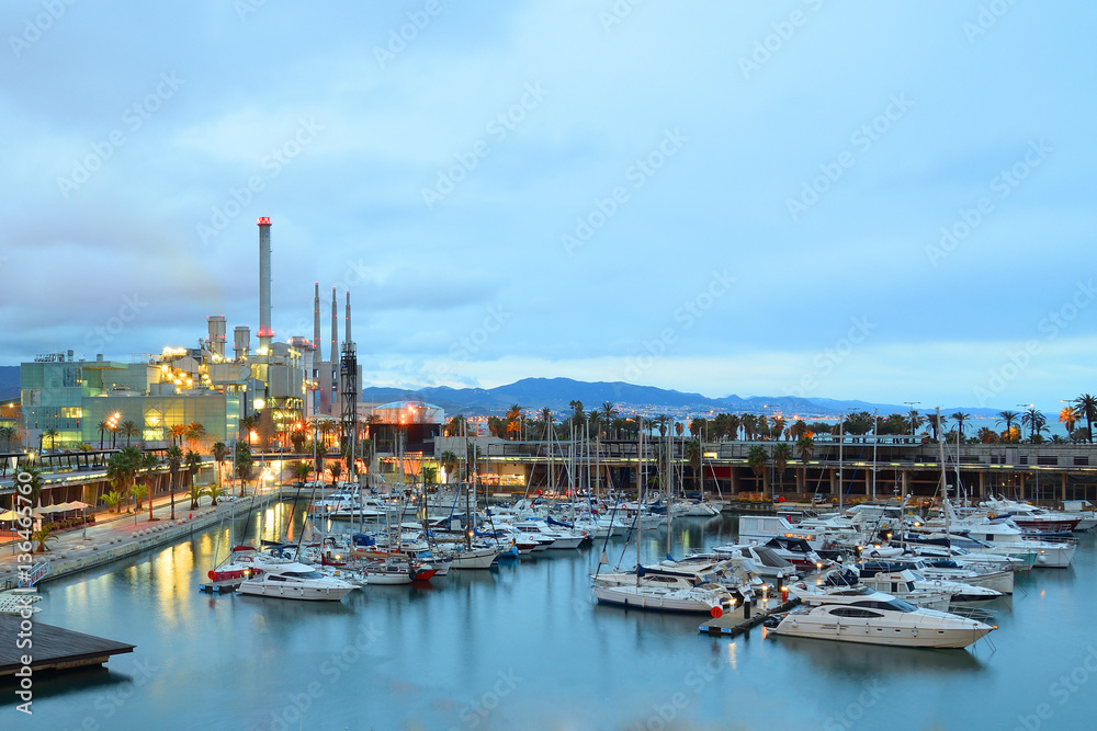 Yachting port with some reflections in Barcelona at night. Empty copy space for Editor's text.