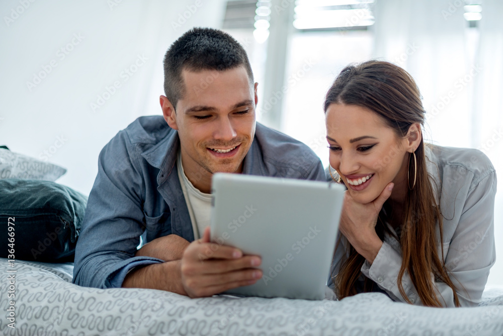 Couple with digital tablet Couple with digital tablet