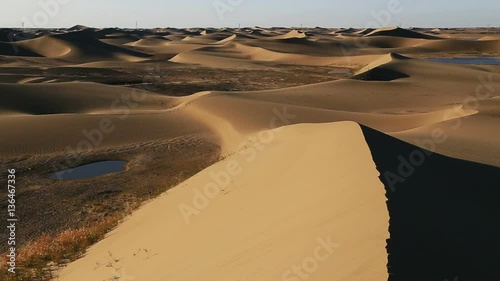 Badain Jaran Desert lake in autumnal morning, Ejina, Alxa, Inner Mongolia, China, 