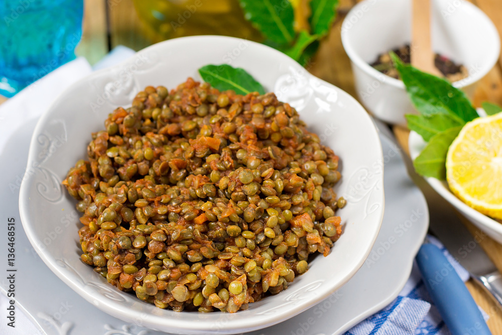 Lentil stew in tomato sauce with cinnamon and spices Lentil stew in tomato sauce with cinnamon and spices