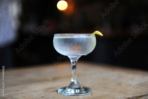 Martini with a twist on a bar