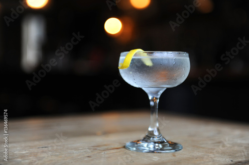 Martini with a twist on a bar