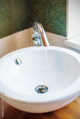 Bathroom interior with white porcelain sink in luxury bathroom