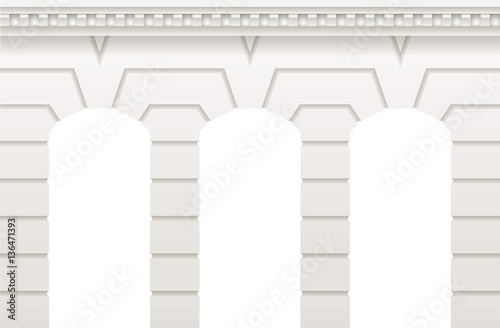 Arch in the wall of white cut stone and travertine marble for a window or door in the classic style