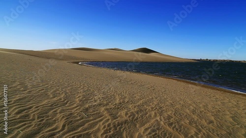 Badain Jaran Desert lake in autumnal morning, Ejina, Alxa, Inner Mongolia, China, 