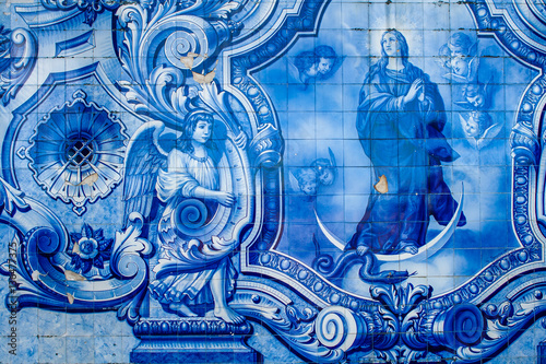 Religious scene in blue azulejos at the Remedios stairs in Sanctuary Nossa Senhora dos Remedios. Lamego, Portugal. photo