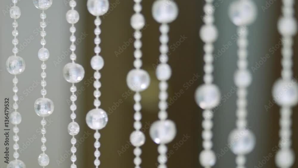 Shining crystal background. Crystal pendants. Crystal stones. Slow motion. Smooth focus Shining crystal background. Crystal pendants. Crystal stones. Slow motion. Smooth focus
