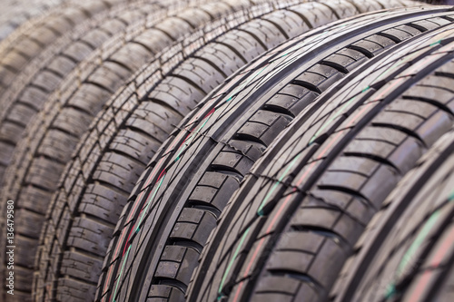 Car tires in a row. Selective focus.