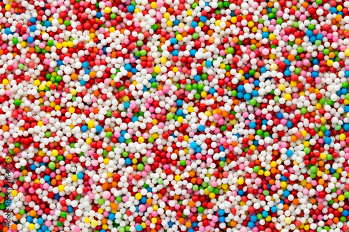 Multicoloured sweet sugar balls. Small ball pattern. © gitusik