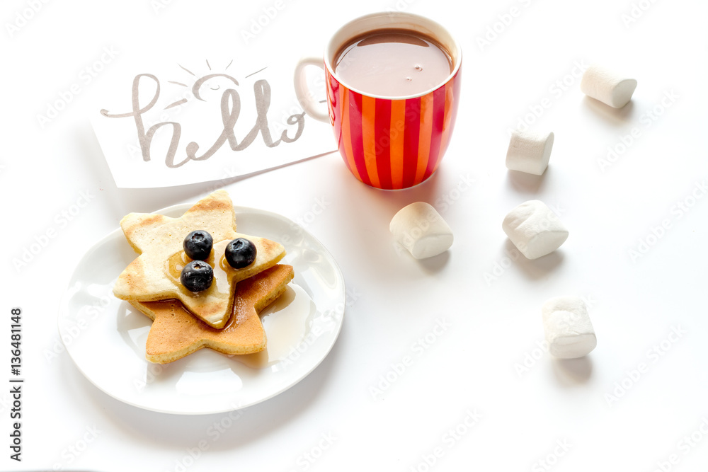 concept kid breakfast with pancake on white background