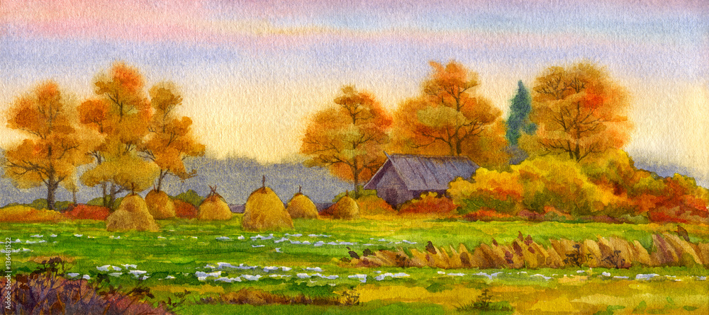 Naklejka premium Haystacks on field