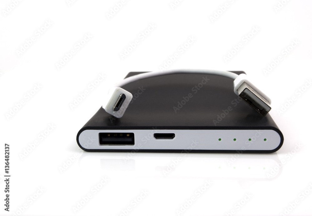 Rechargeable backup battery for small electronic device. White background. Rechargeable backup battery for small electronic device. White background.
