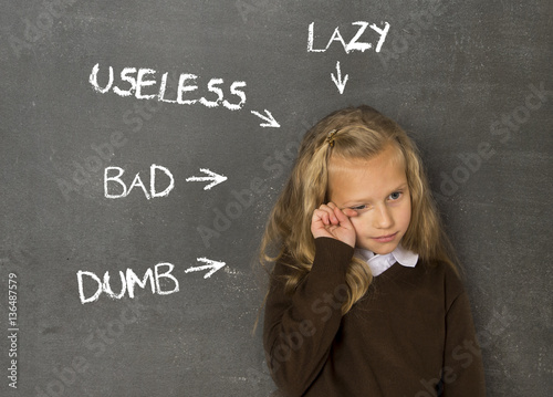 abused disciplined schoolgirl pointed as lazy dumb bad and useless on class blackboard