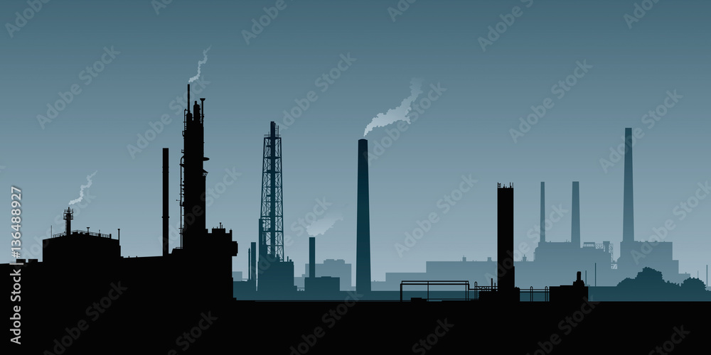 A silhouette of a heavy industrial area with smokestacks and factories.