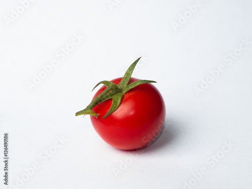 One isolated tomato