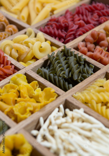 Variety of types, colors and shapes of Italian pasta. Dry pasta