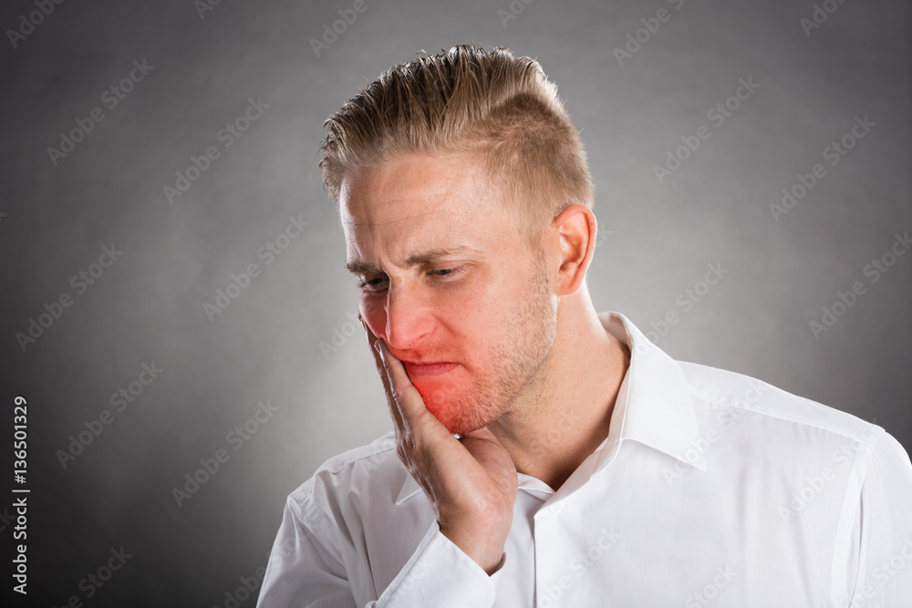 Young Man Suffering From Tooth Ache Young Man Suffering From Tooth Ache