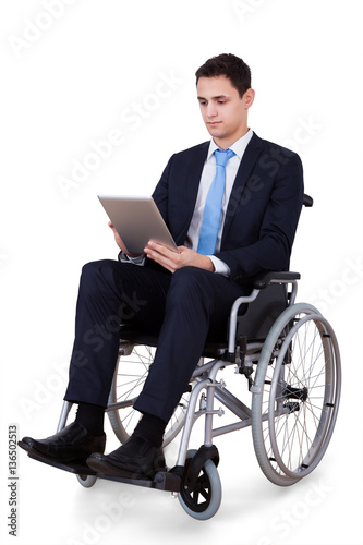Handicapped Businessman Using Digital Tablet