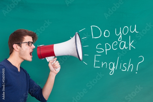 Man Doing Announcement Of English Speaking On Megaphone