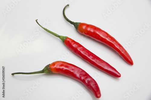 red chili peppers on white background