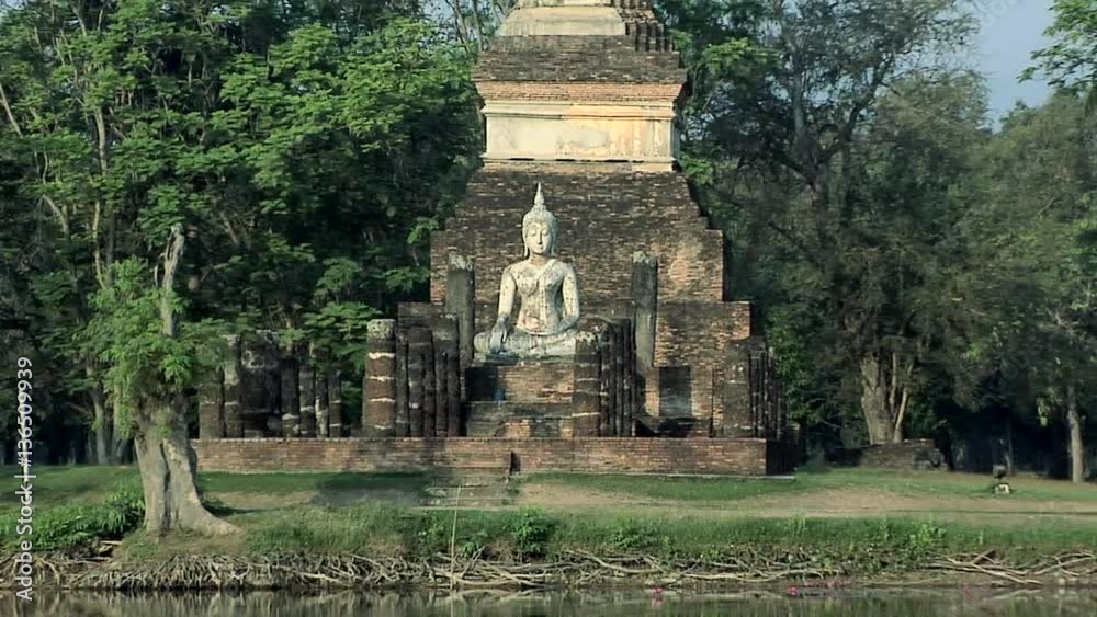 Buddha Statues at the Ruins of Wat Tra Phang Ngoen at the Historical Park of old Sukhothai Buddha Statues at the Ruins of Wat Tra Phang Ngoen at the Historical Park of old Sukhothai