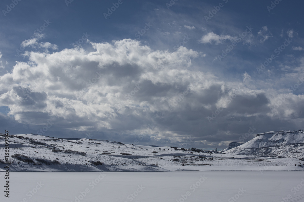 Fototapeta premium Clouds over Blue Mesa Reservoir, Curecanti National Recreation Area.