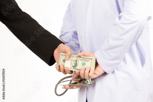 Male giving bribe to doctor
