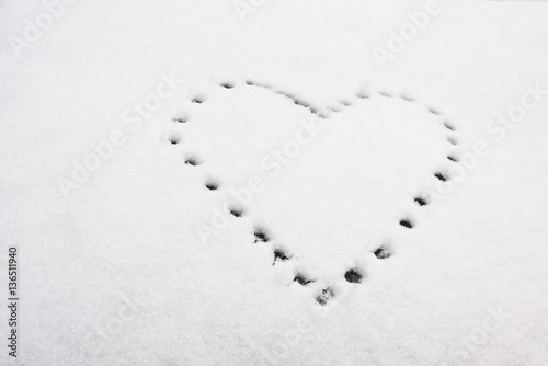 Shape of heart on snow