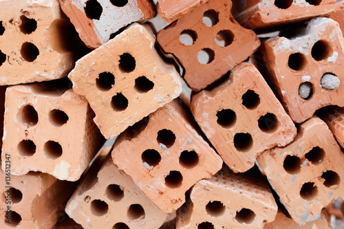 A pile of red brick closeup