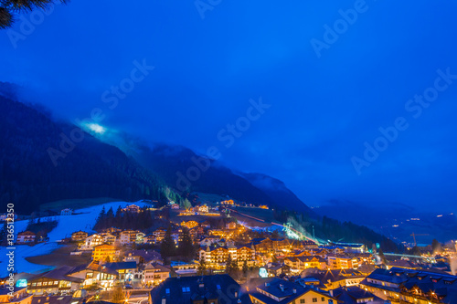 night view of mountain village in alpine valley © Vivida Photo PC