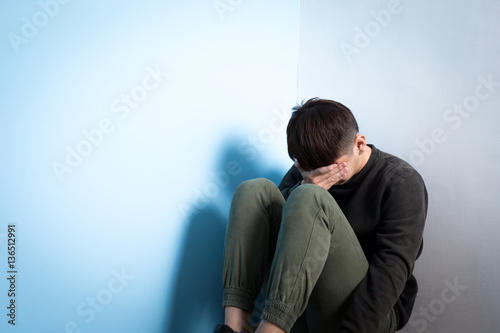 depression man sit on floor