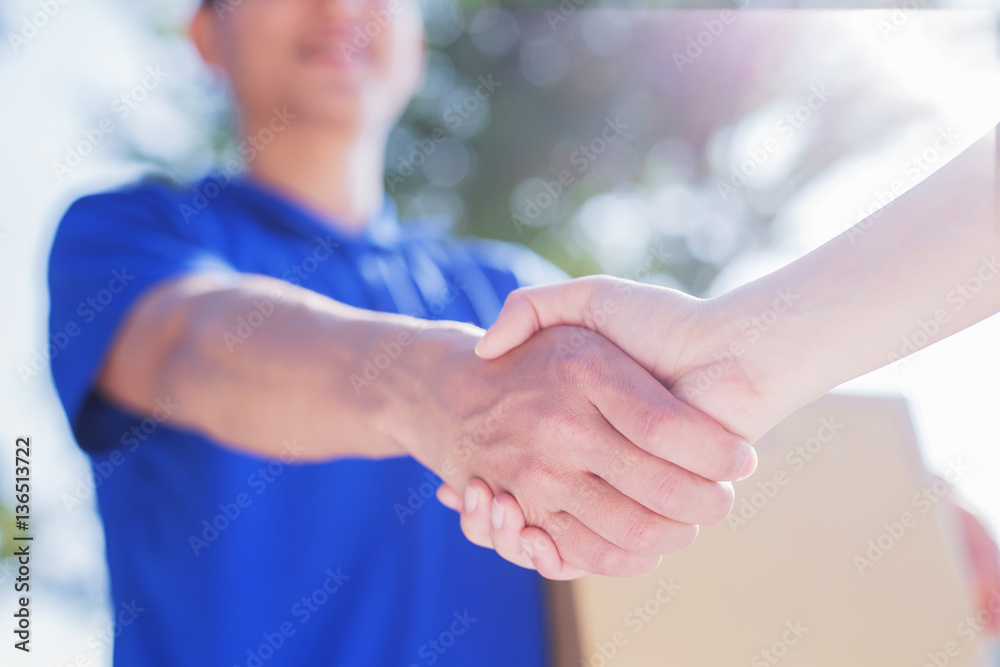 deliveryman stand and shake hand