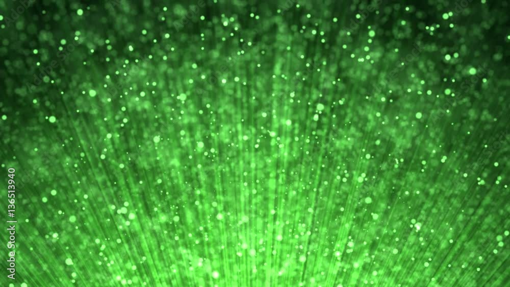 Festive volume light rays with glitter particles bokeh looped animated abstract motion green background. Computer generated magical shining beams