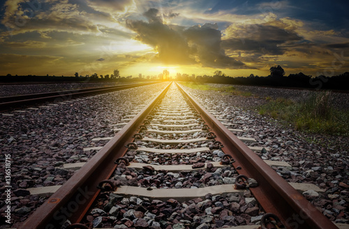 railroad for transportation with sunlight and silhouette, darkto