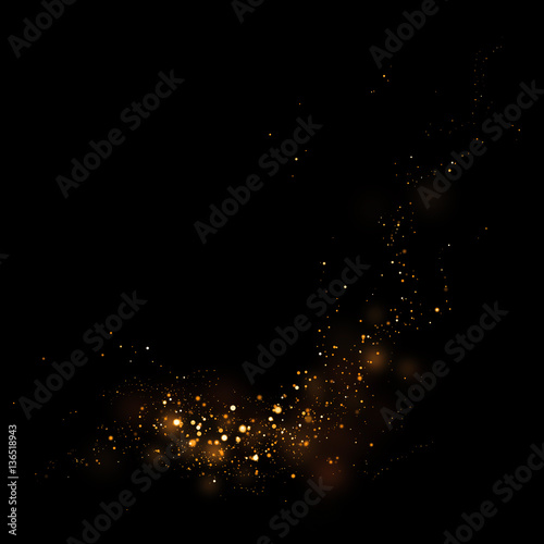 Gold glittering star light and bokeh.Magic dust abstract 