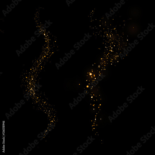 Gold glittering star light and bokeh.Magic dust abstract 