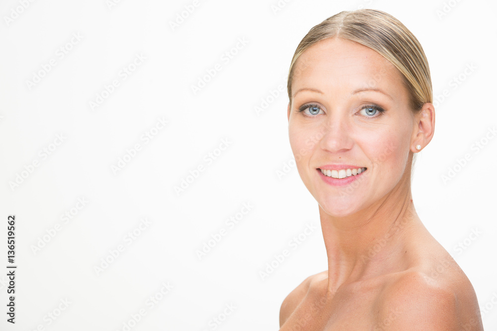 blonde smiling young woman with green dress isolated on white blonde smiling young woman with green dress isolated on white