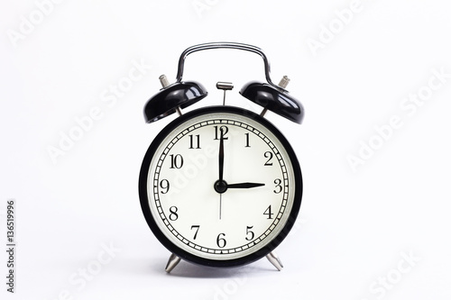 classic table clock on a white background. decor element