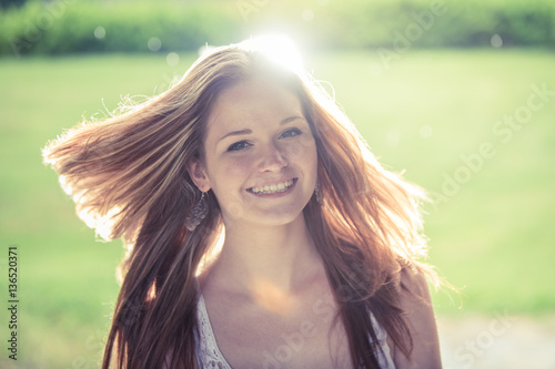 young redhead woman outdoor portrait 