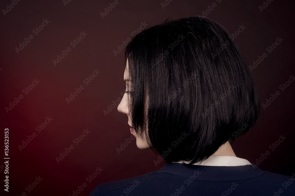 Fototapeta premium Close-up portrait of girl with short dark hair